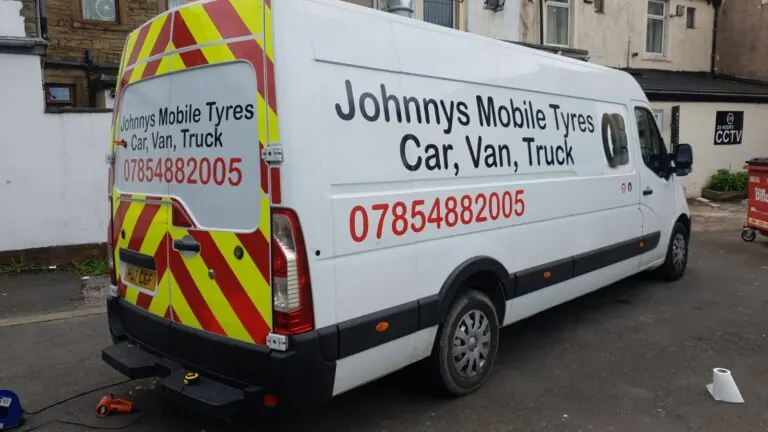 Johnnys Mobile Tyres: Roof-height lettering and chevron rear markings