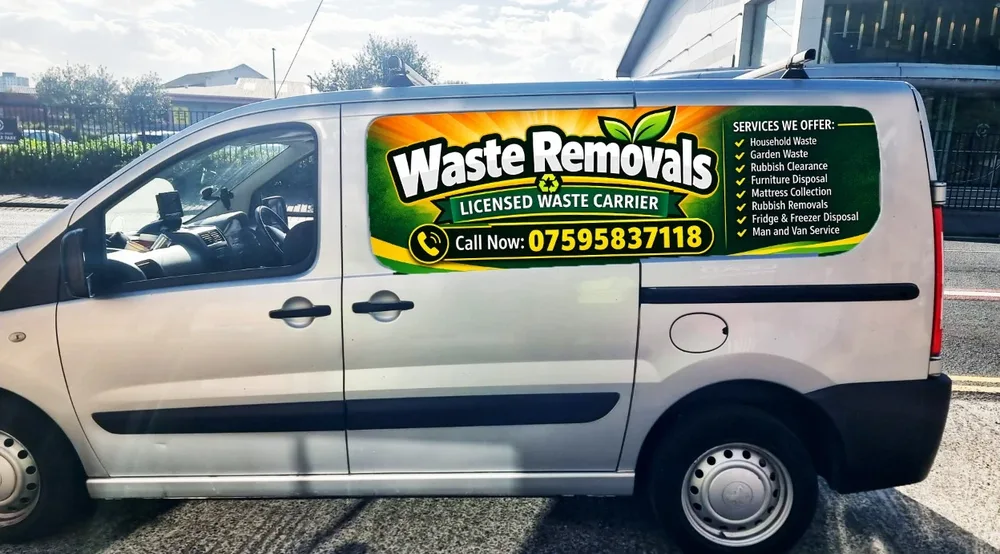 Silver van with printed Waste Removals side panel graphics