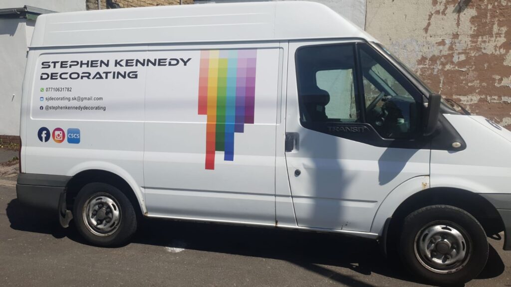 Stephen Kennedy Decorating Transit with logo and social media icons on the side