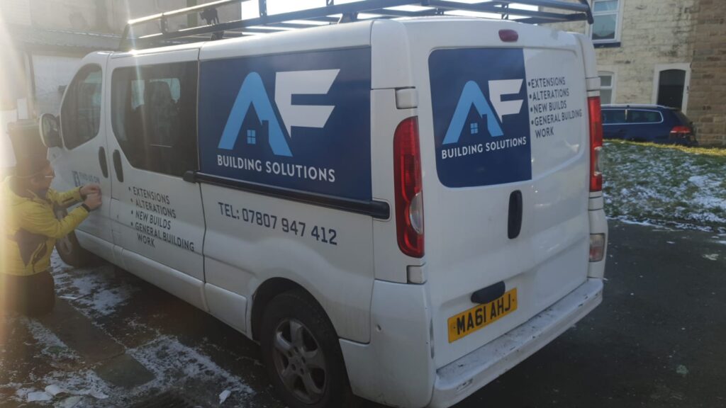 AF Building Solutions van with cut vinyl logo and contact details