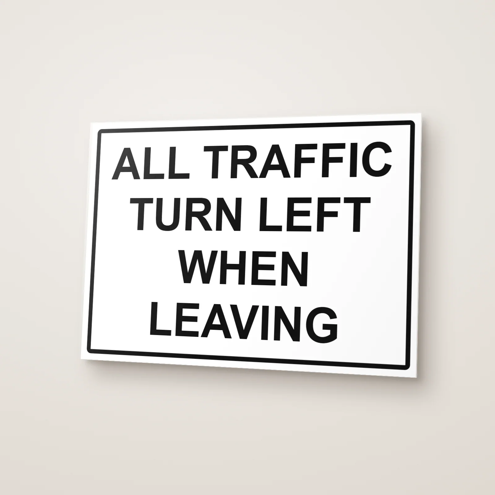All Traffic Turn Left When Leaving Sign