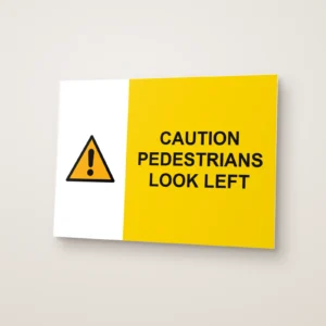 Caution Pedestrians Look Left Sign