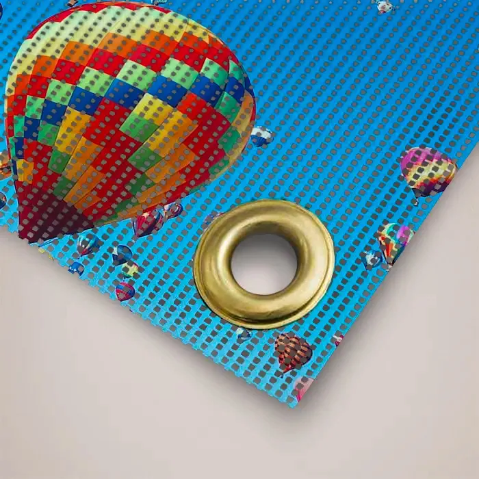 2m x 1m Mesh Banner: close up of a mesh banner hem and eyelet