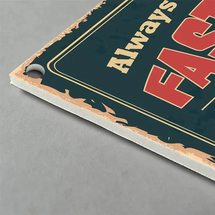 Printed Menu Boards: close up of a printed foamex menu board with drilled holes