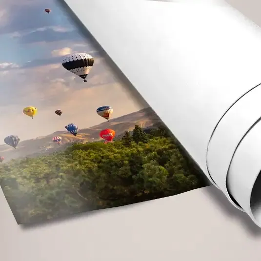 10ft x 3ft PVC Banner: printed banner partly rolled up showing the print quality