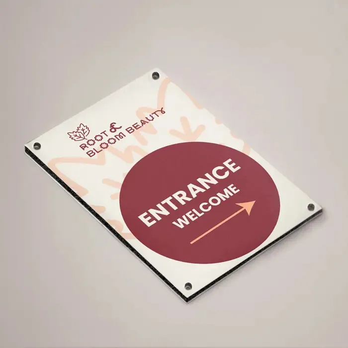 A2 Dibond Signs: printed dibond entrance sign on a wall