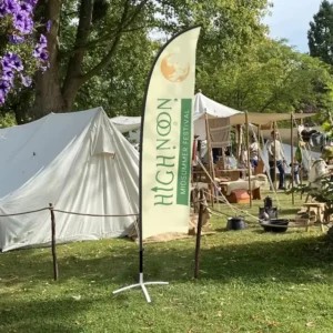 Feather Flag 3.2m: printed feather flag at an outdoor festival